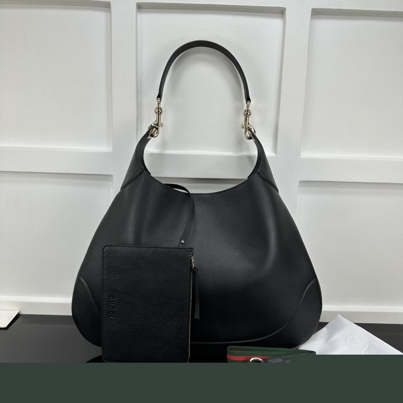 G*u*i top handle bags